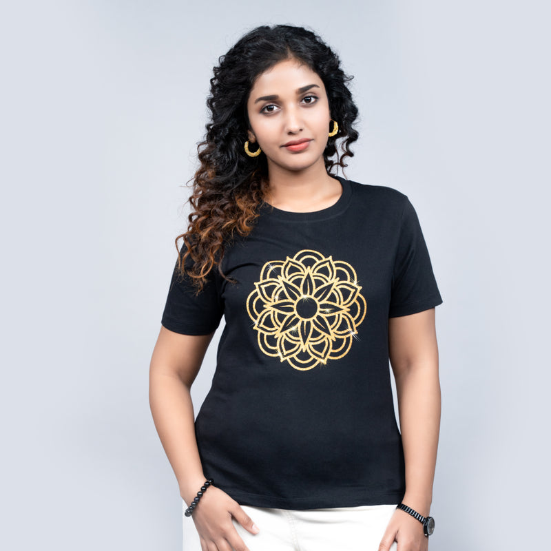 Black women's tee front close-up with gold mandala design