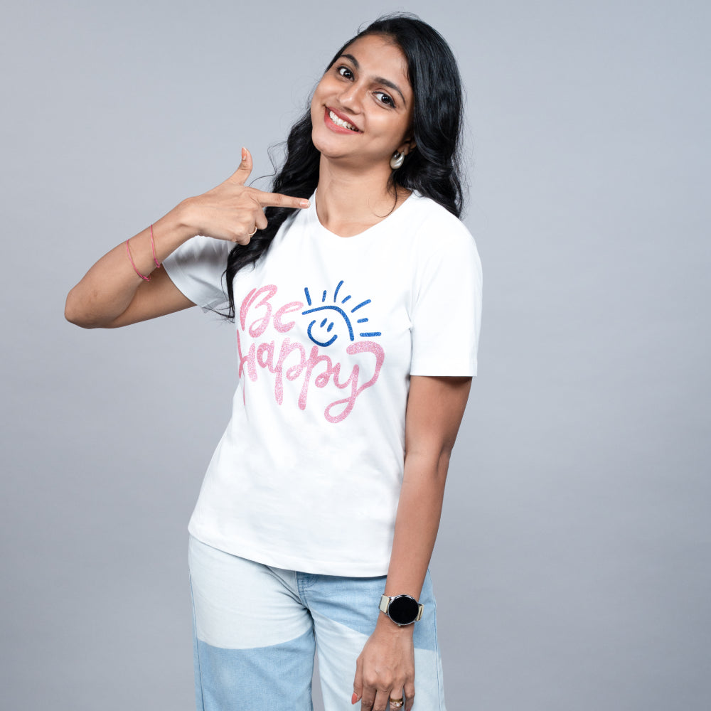 White women’s tee front close-up with glitter ‘Be Happy’ vinyl print