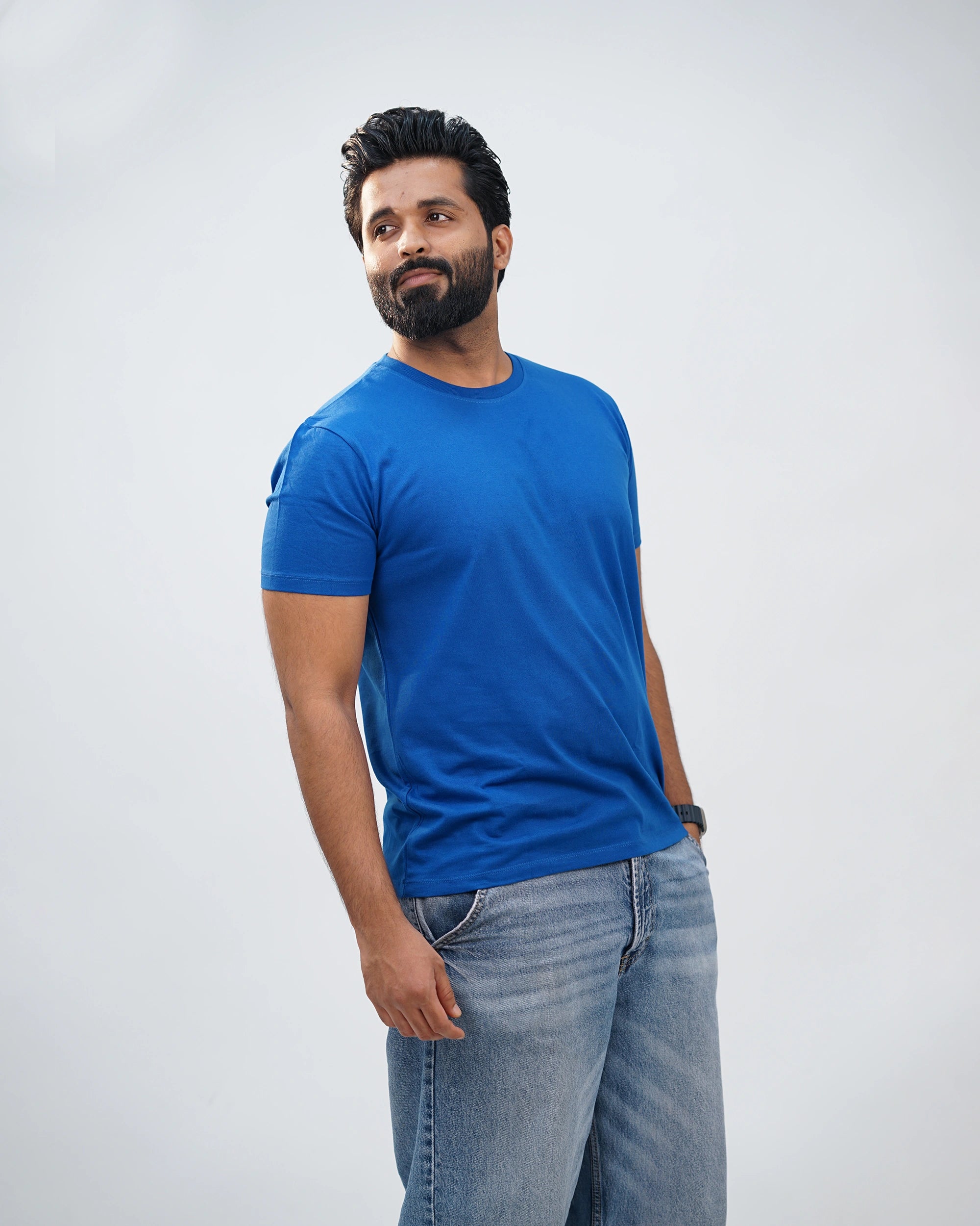 Side-angle view of navy-blue tee showing its clean cut and comfortable fit