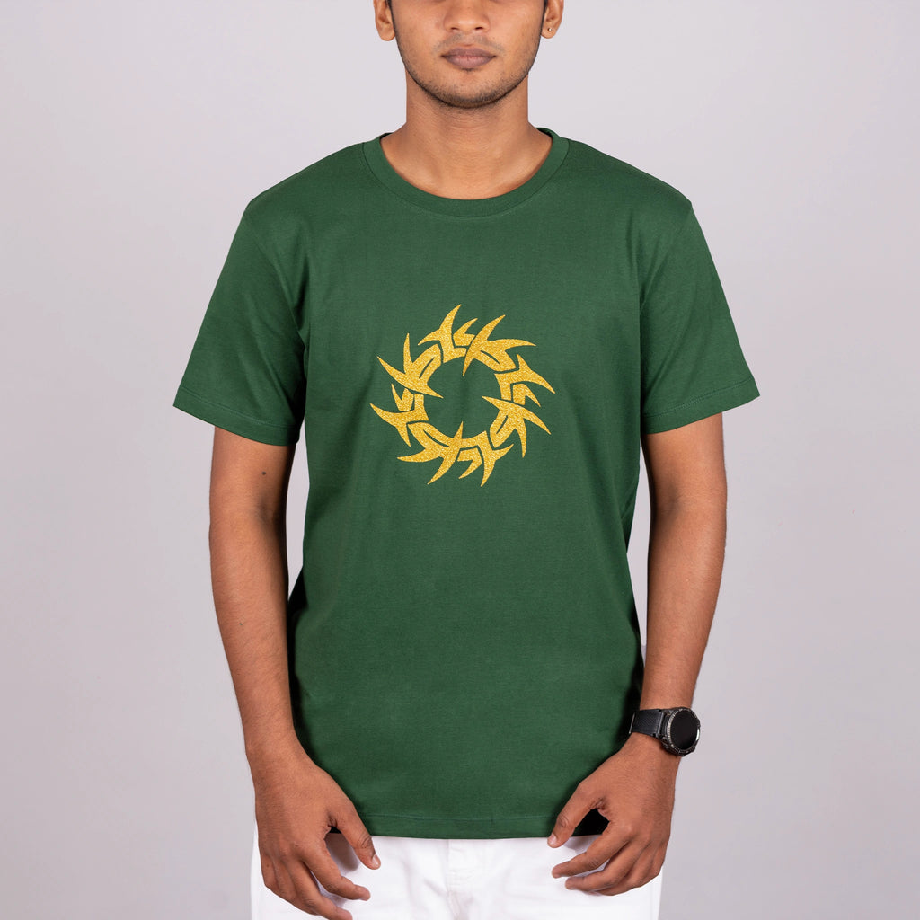Side profile of bottle green tee highlighting relaxed fit and glitter print catch