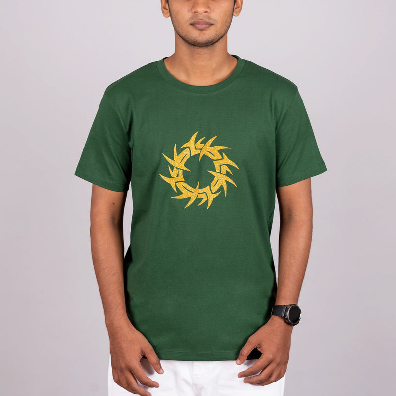 Side profile of bottle green tee highlighting relaxed fit and glitter print catch