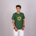 Man wearing bottle green tee with glitter “Tribal Tech Circle” print—bold, modern comfort in India