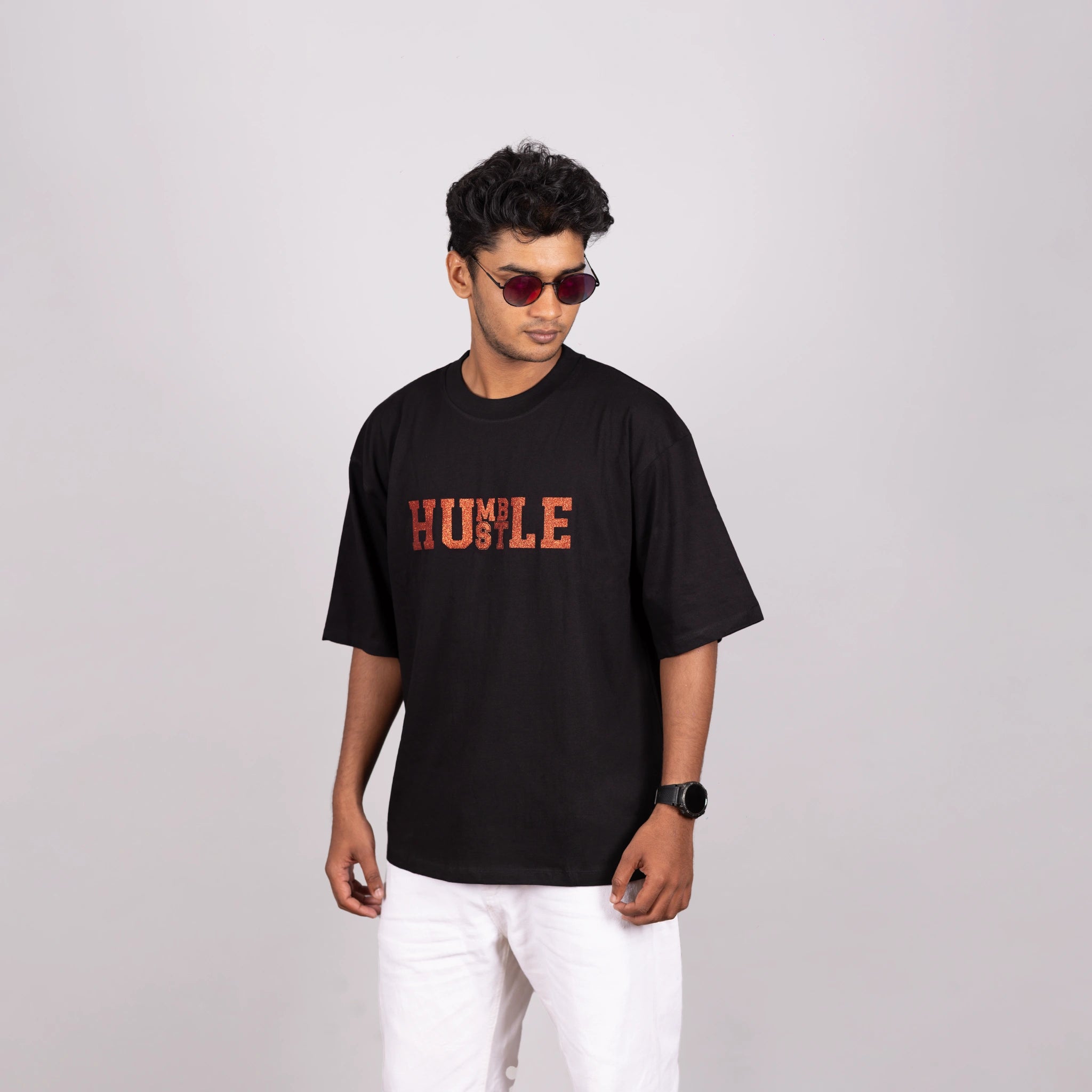 Casual dressed look in "Humble Hustle" tee, modern comfort vibe