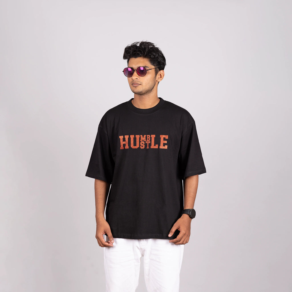 Side view of oversized tee, soft fit and bold text display