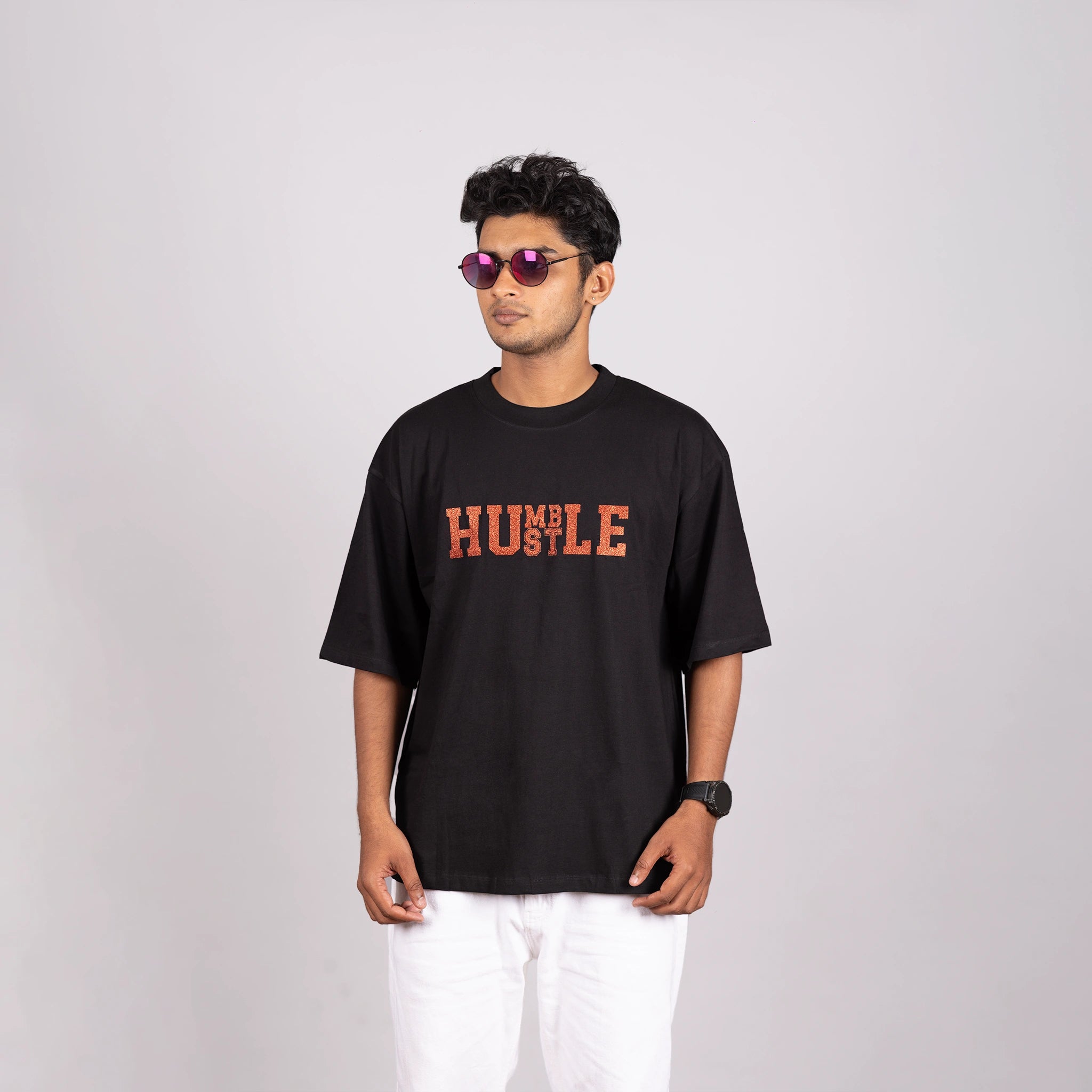 Side view of oversized tee, soft fit and bold text display