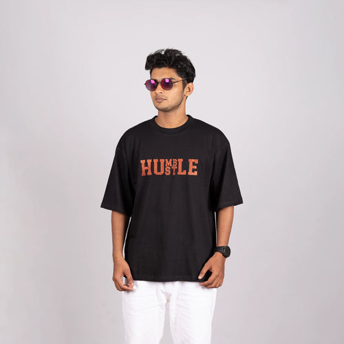 Side view of oversized tee, soft fit and bold text display