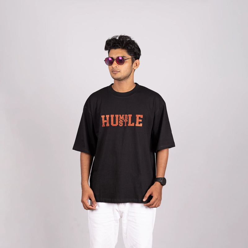 Side view of oversized tee, soft fit and bold text display