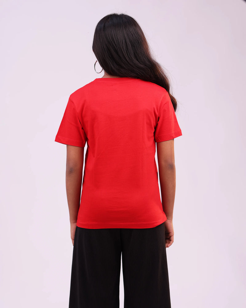 Back view of kids “Travel Child” tee—clean silhouette, premium cotton texture