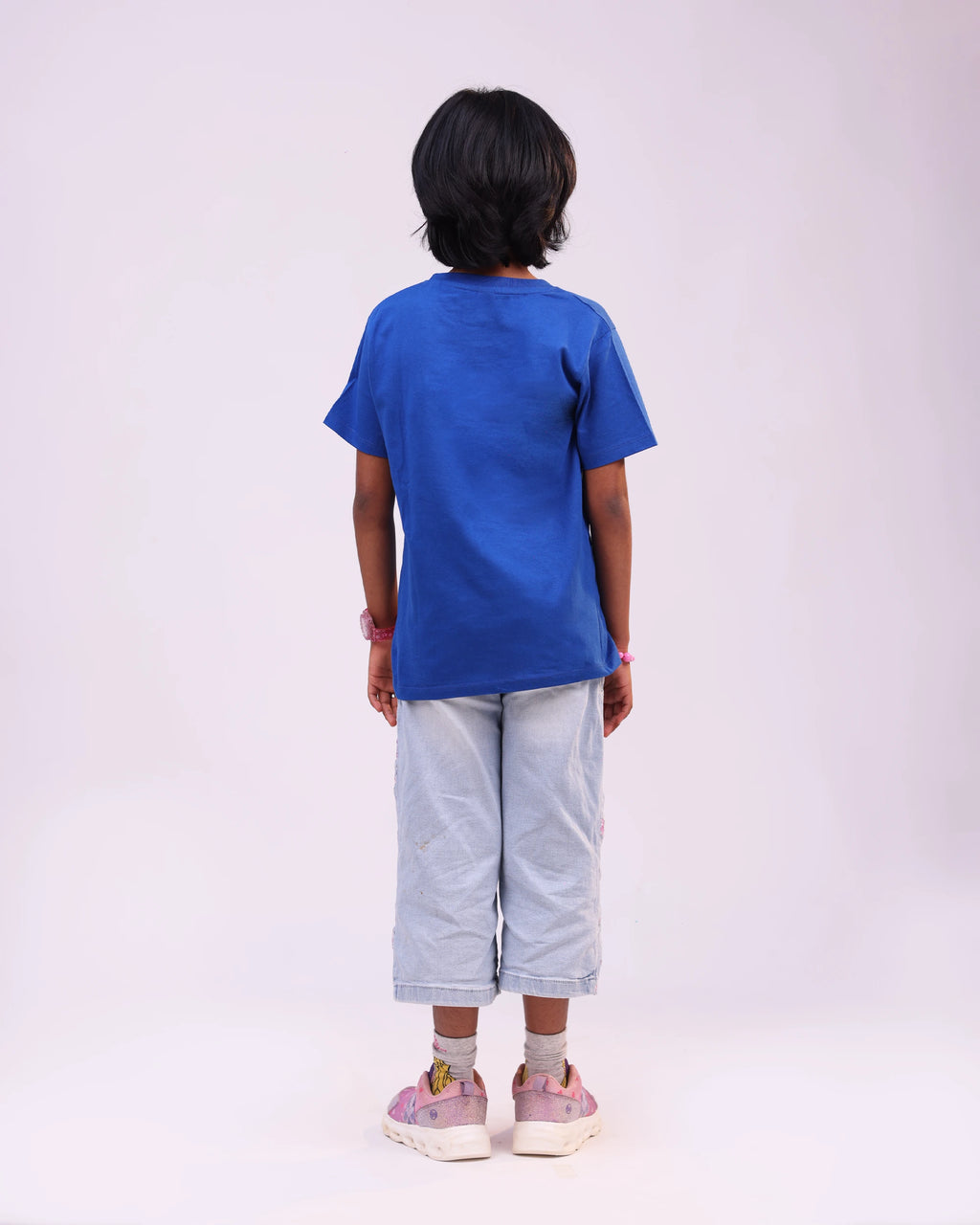 Back view of unisex kids tee – clean look and relaxed fit