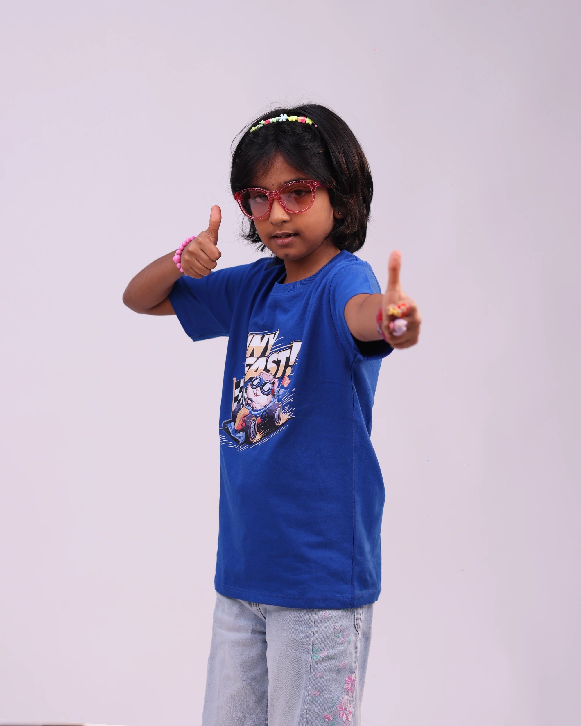Front view of “Tiny but Fast” kids tee – playful graphic for boys & girls