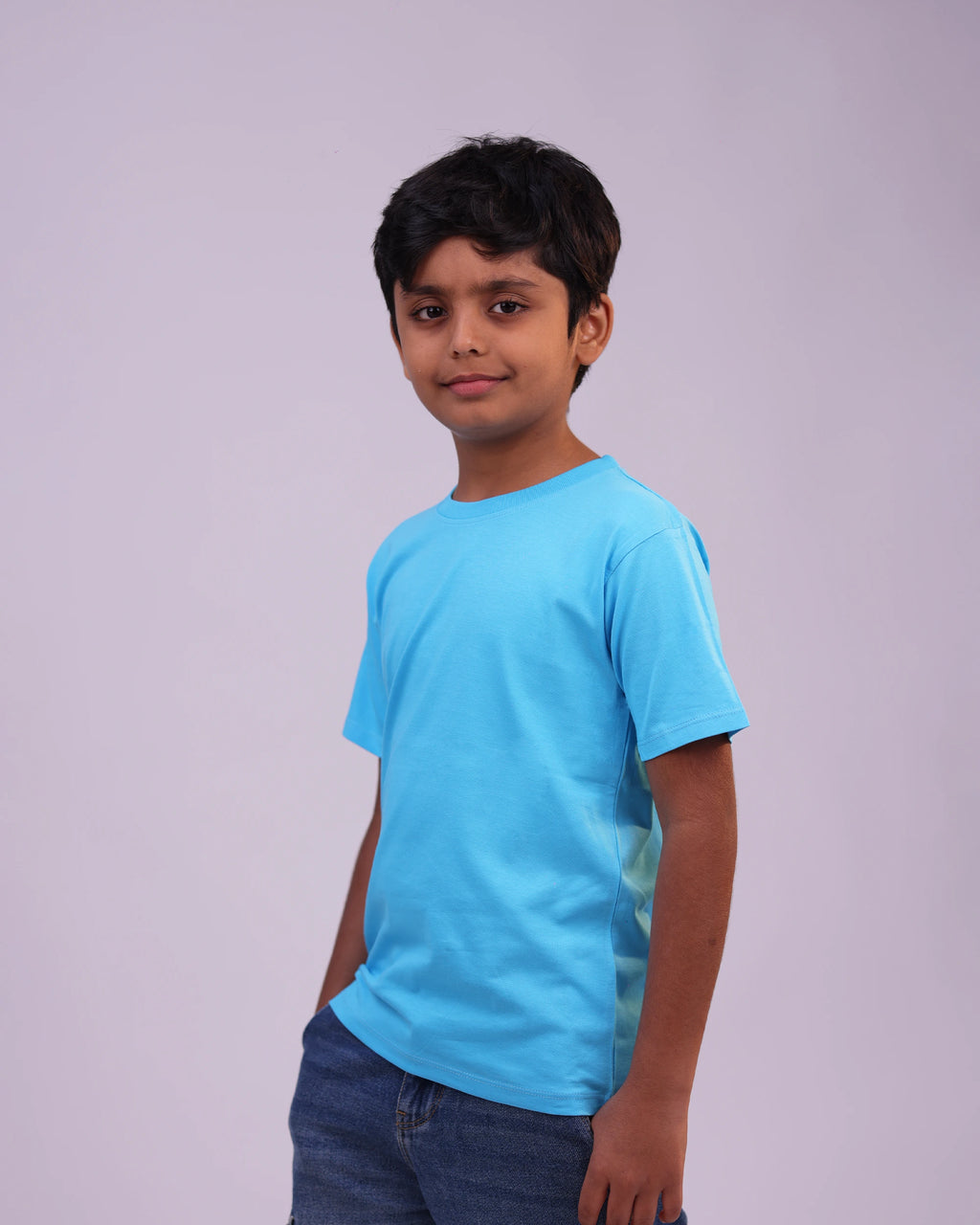 Side profile of sky-blue kids tee—relaxed fit for boys & girls