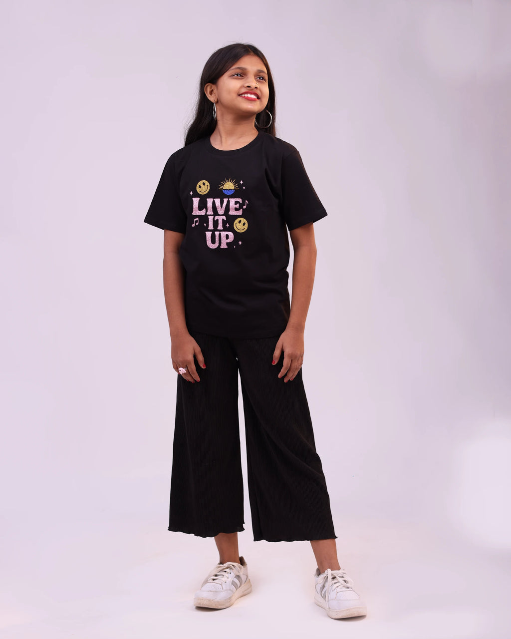 Side profile of “Live It Up” kids tee — relaxed fit and bold print