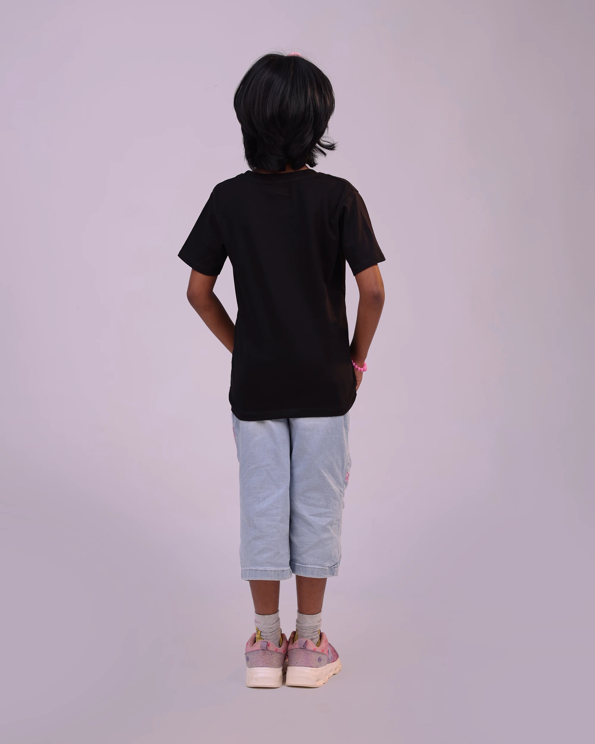Back view of “Space Explorer” unisex girls tee—clean silhouette and comfy shape