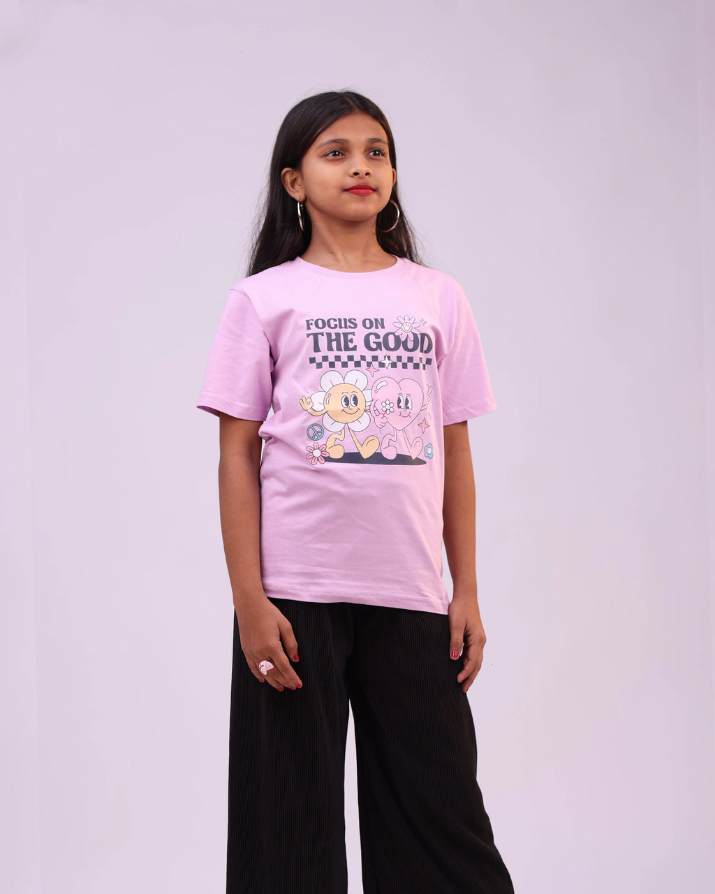 Side profile of “Focus on the Good” kids tee—relaxed fit, uplifting vibe