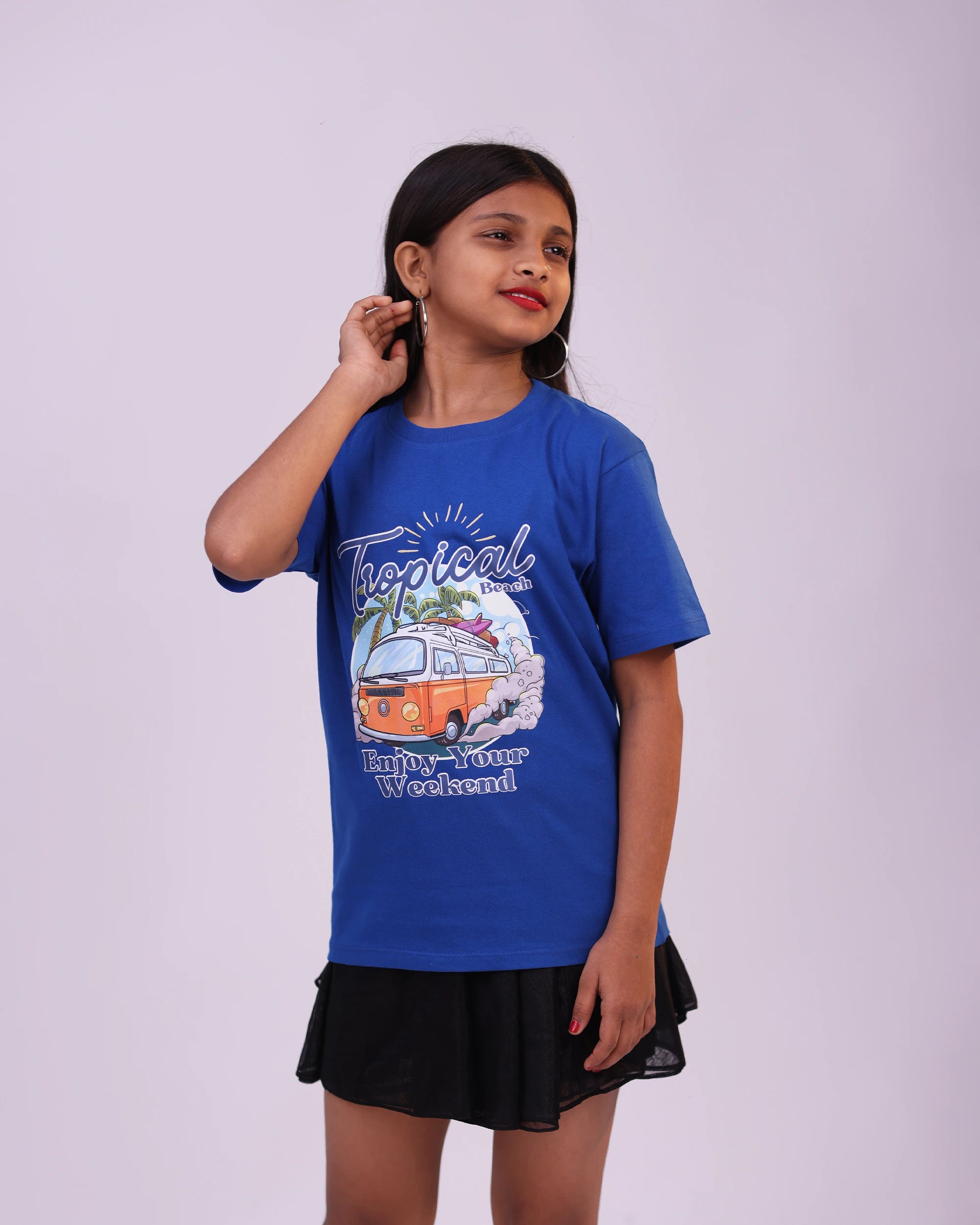 Playful model pose wearing Tropical Beach kids tee – stylish unisex wear