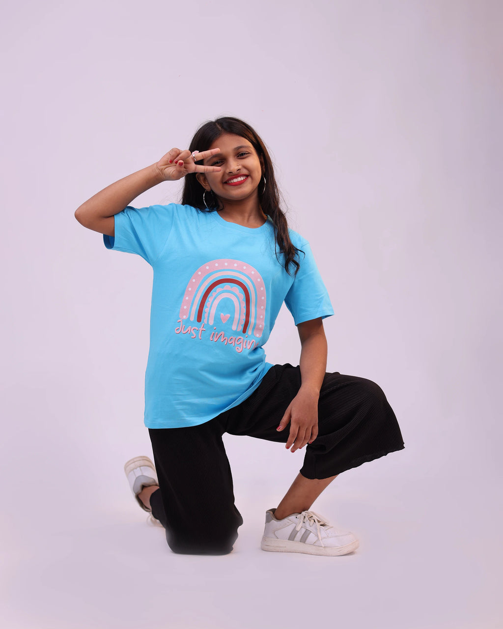 Right side profile of sky blue “Just Imagine” tee—playful comfort