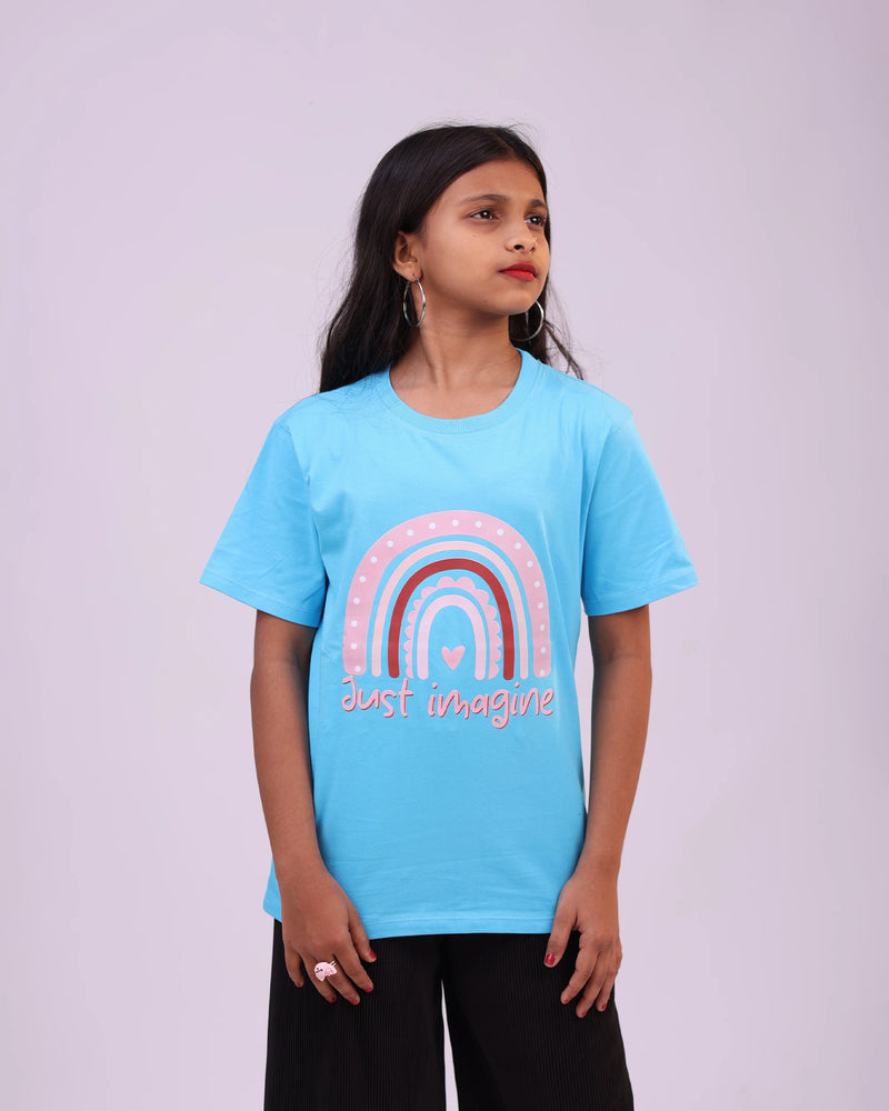 Left side view of “Just Imagine” tee—relaxed fit and fantasy-inspired design