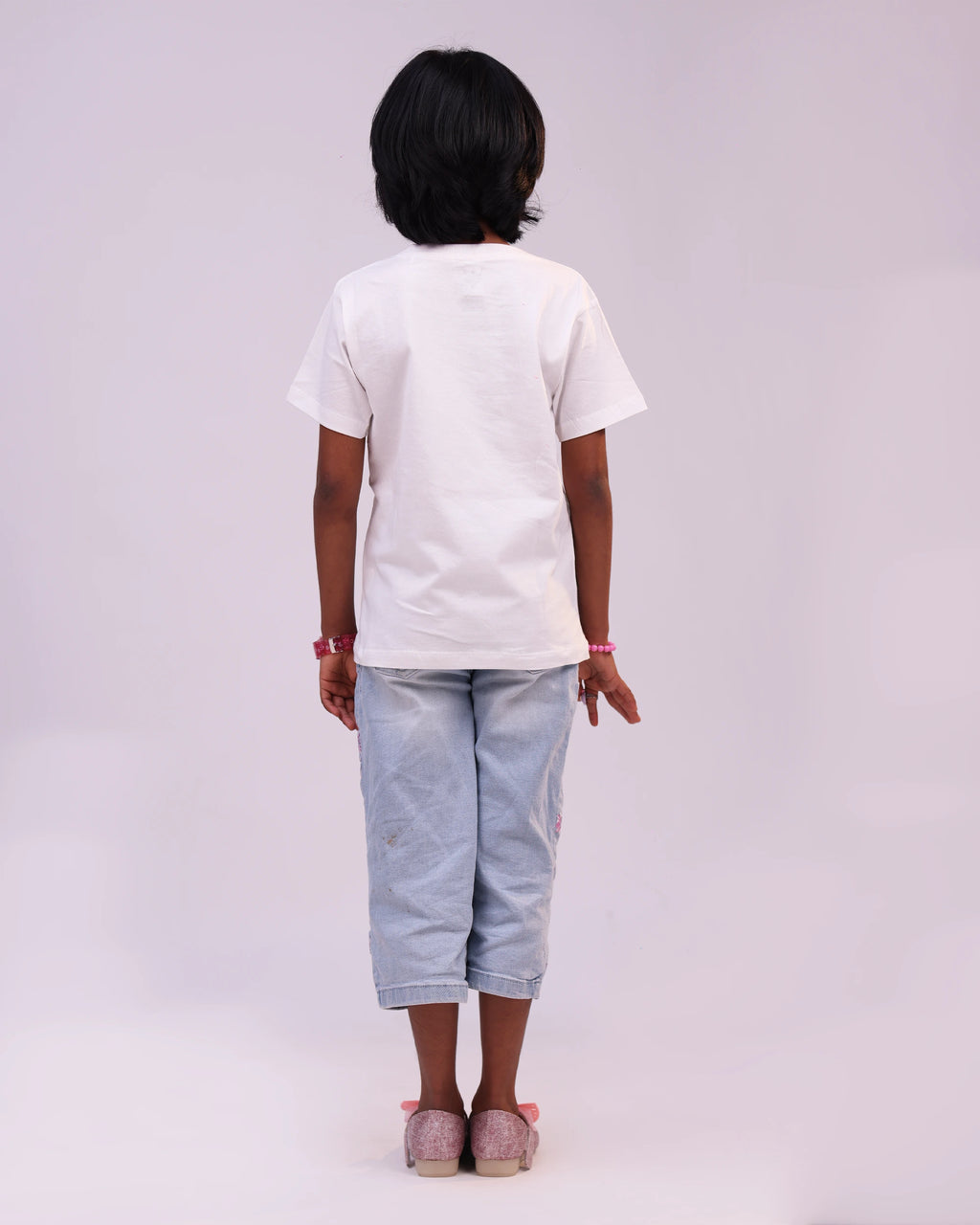 Back view of “Zoo Crew” tee—clean silhouette and playful vibe