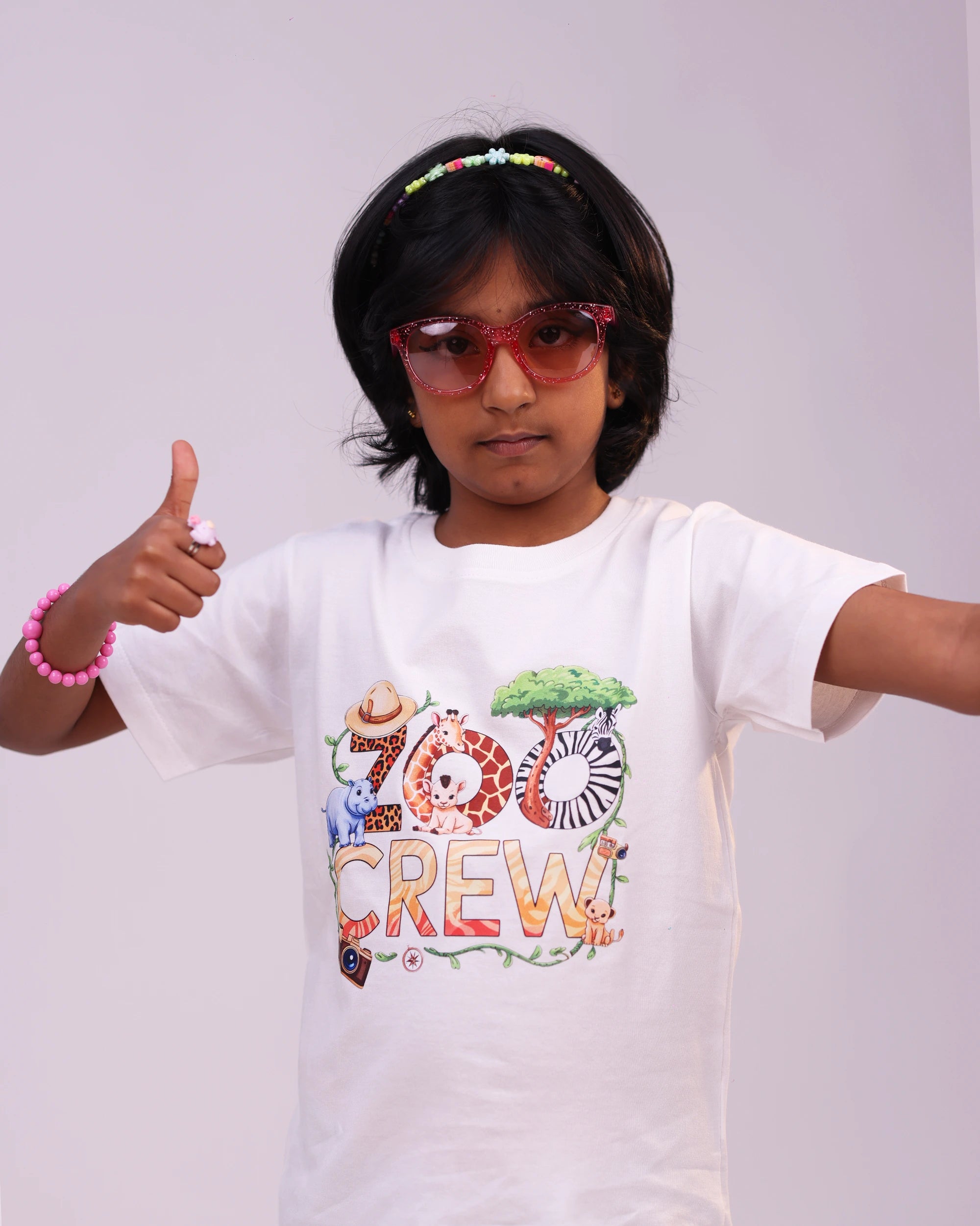 “Zoo Crew” kids tee front view—bright animal print, soft cotton for boys & girls