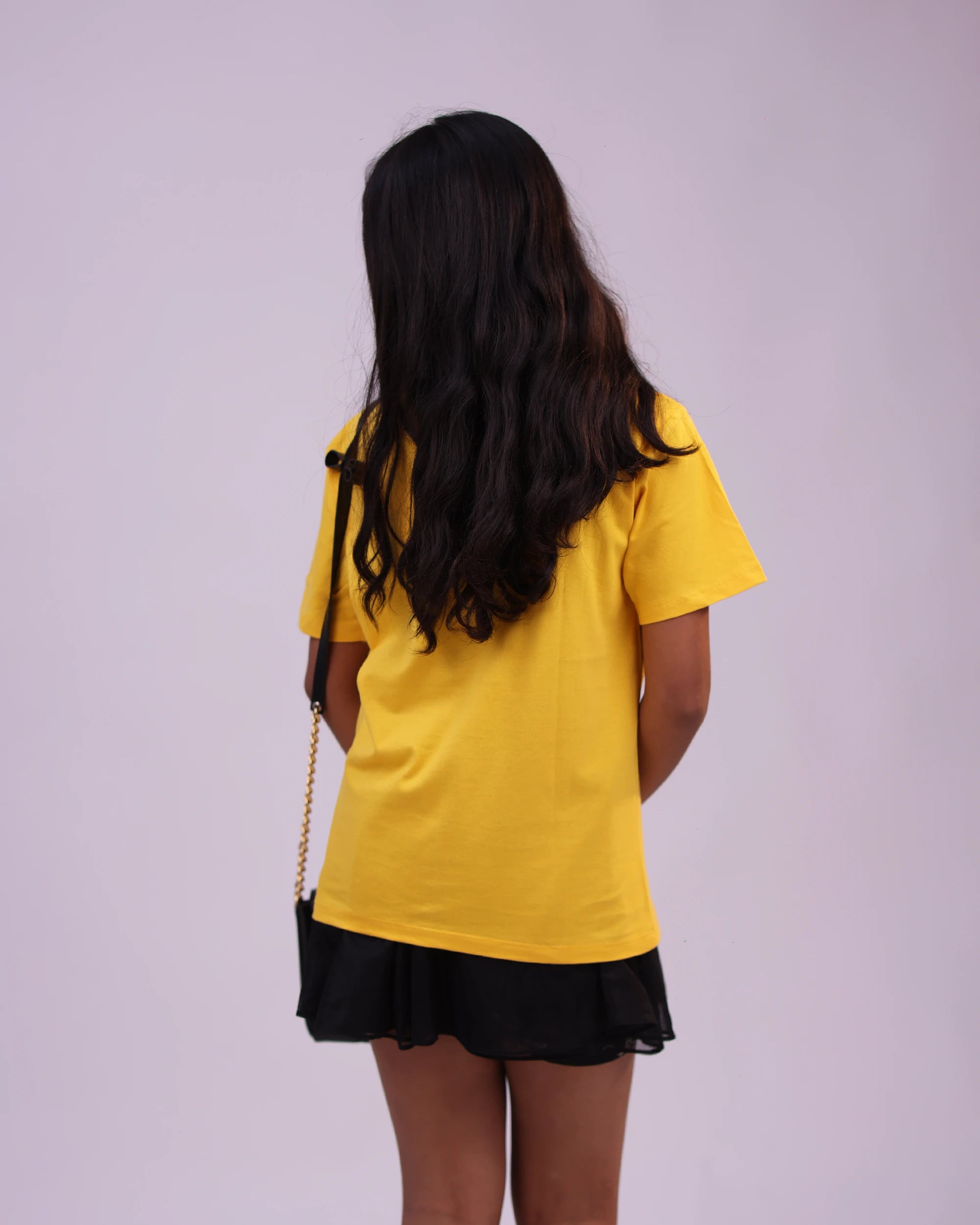 Back view of “Be Cool Be Kind” unisex kids tee – smooth finish and relaxed style