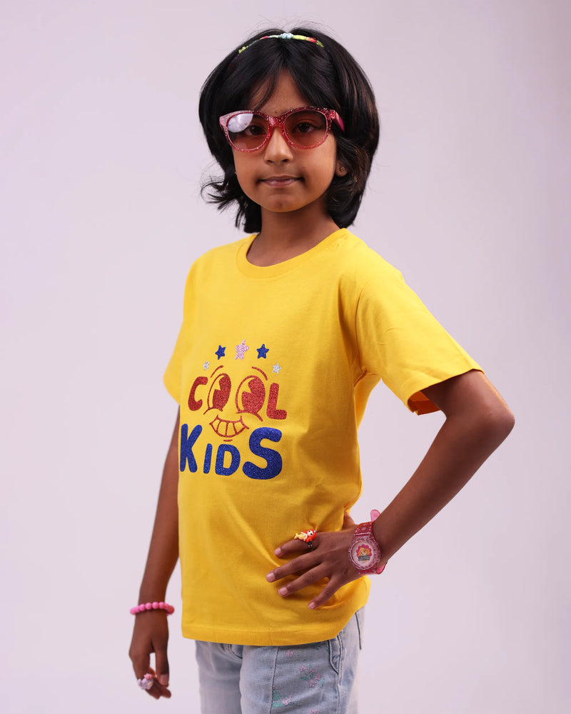 Side profile of “Cool Kids” tee—relaxed fit and bright style
