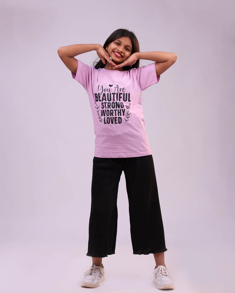 Side profile of purple kids tee with motivational text—soft cotton for boys & girls