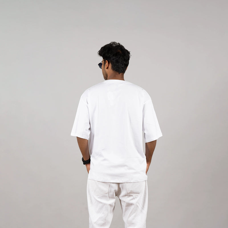 Back view of white tee—clean silhouette and premium fabric ensuring comfort from every angle