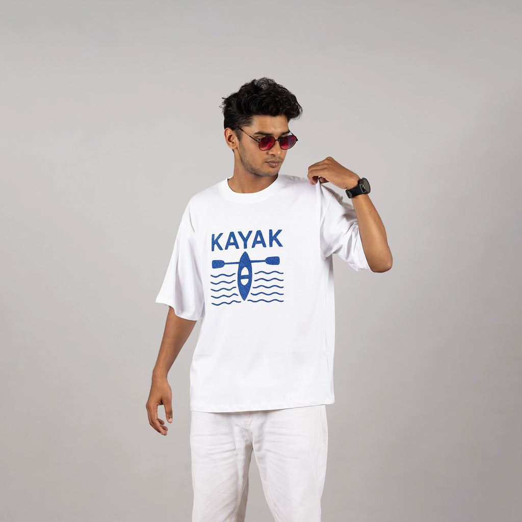 Close-up shot of the “Kayak” print on white tee—multi-color design highlighting detail