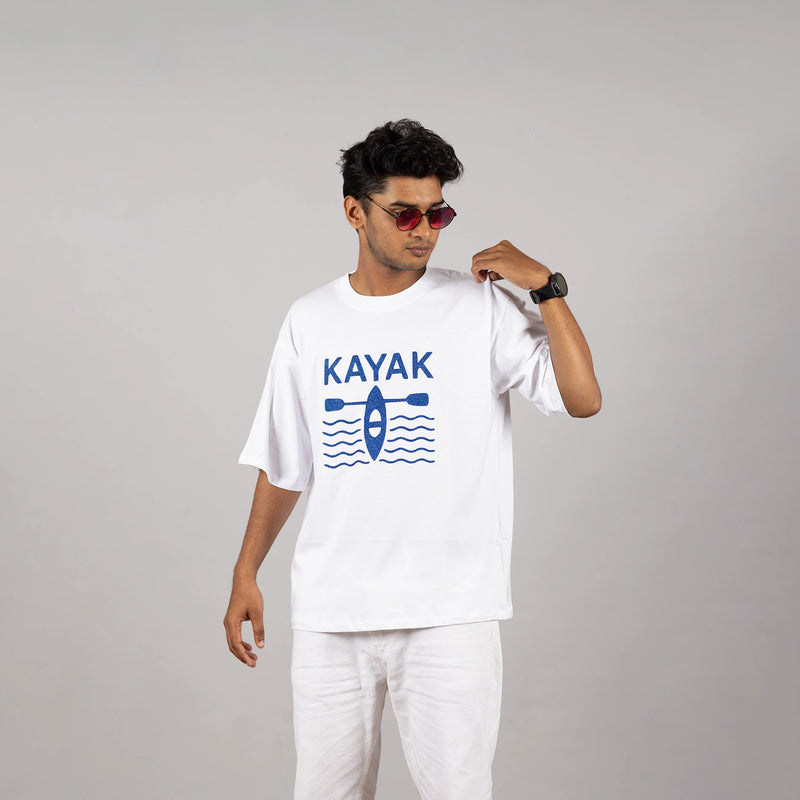 Close-up shot of the “Kayak” print on white tee—multi-color design highlighting detail