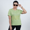 Kiwi green women's tee front close-up with glitter 'Don't Quit' design