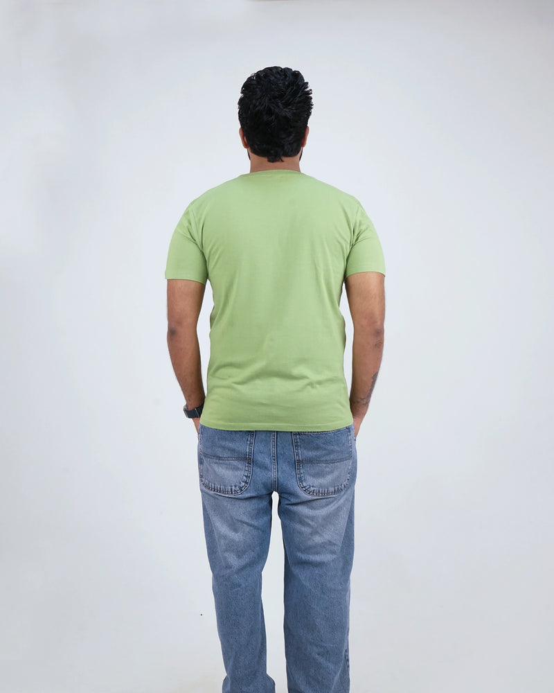 Back view of Kiwi Green round neck tee for men, showcasing smooth finish and clean design