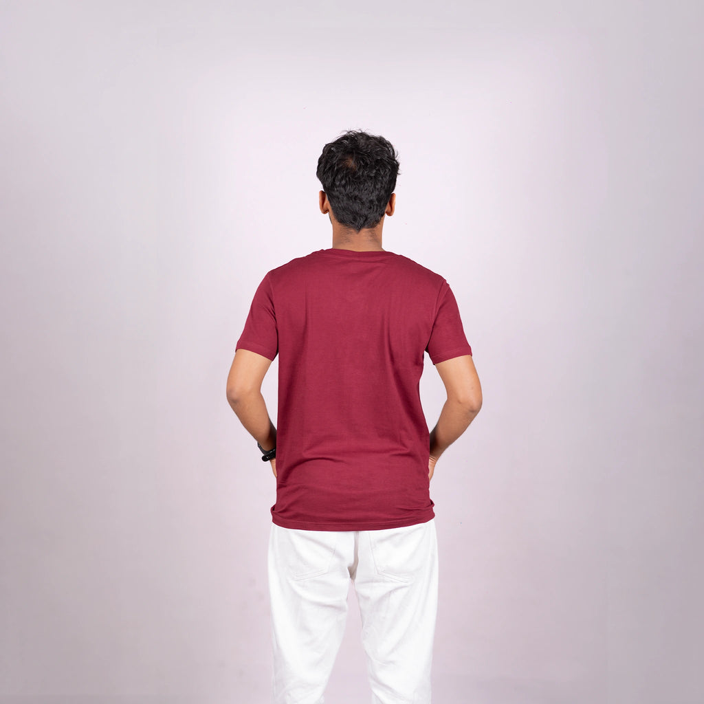 Back of maroon tee emphasizing clean silhouette, luxe fabric, and premium drape