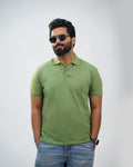 Man wearing moss green polo tee with chinos—casual refinement for men in India