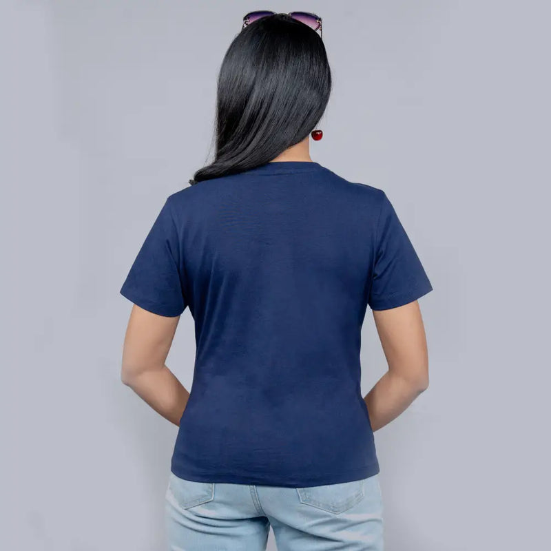 Back-angle of navy blue “Stay Cool” tee highlighting relaxed fit and glitter typography