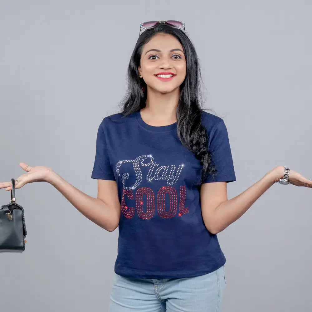 Close-up of navy blue tee showcasing glitter vinyl “Stay Cool” lettering