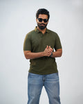 Man wearing olive green polo tee with chinos—relaxed refinement meets timeless style