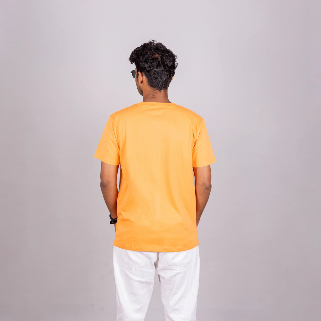 Pose Type	Alt Tag	Image Title
Pose 4 – Back View	Back view of sunset orange “HOPE” tee showing clean, minimalist design and relaxed oversized fit