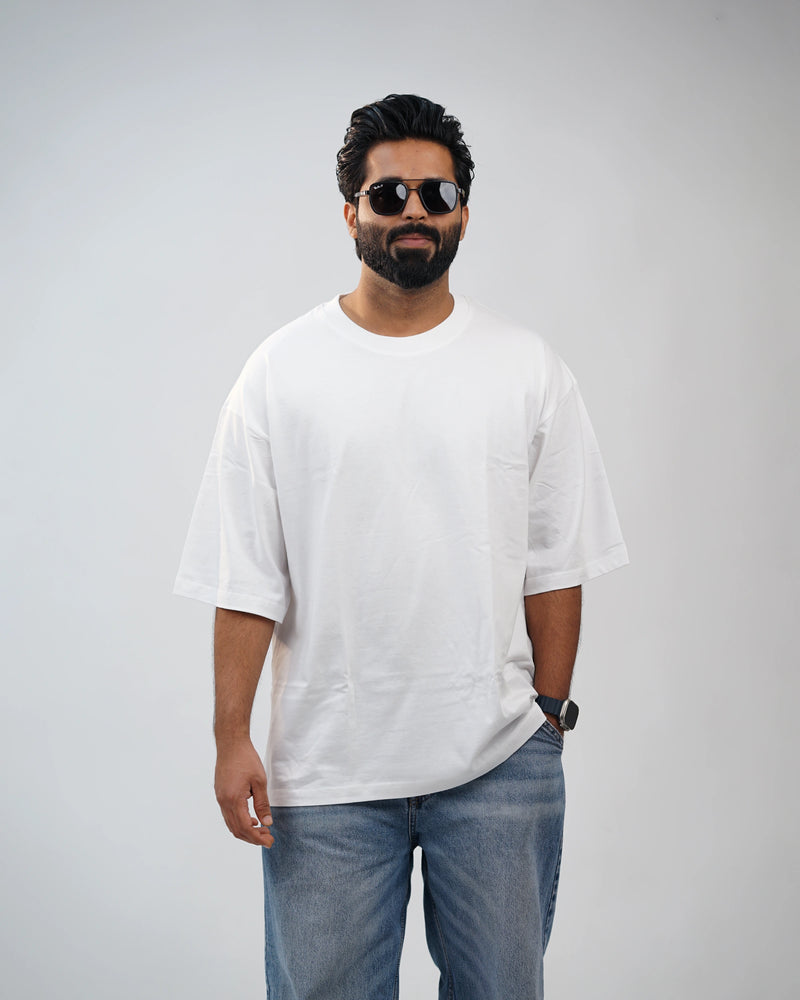 Close-up of oversized white tee neckline and breathable cotton weave