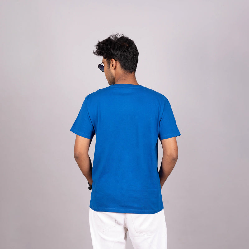 Back view of UNFAZED tee showcasing clean lines and soft cotton silhouette