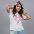 White women’s tee front close-up with glitter heart motif